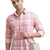 Long sleeve, spread collar cotton men's shirt with a regular fit.